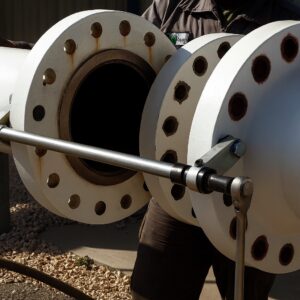 Low Pressure Valve Removal tool on a joint removing a valve