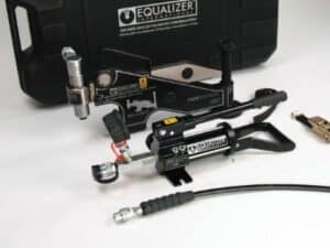FA9 hydraulic flange alignment tool set by Equalizer International, including pump, cylinder, hoses, and case for precision bolt-hole alignment in industrial piping systems.